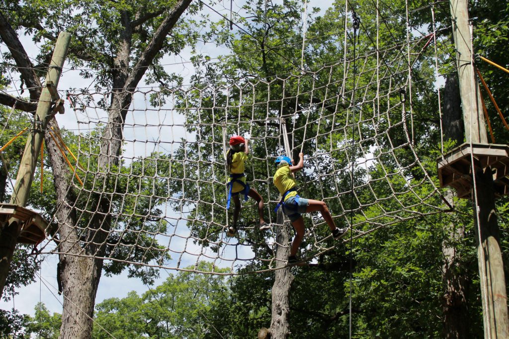 photo of participants on the high ropes course